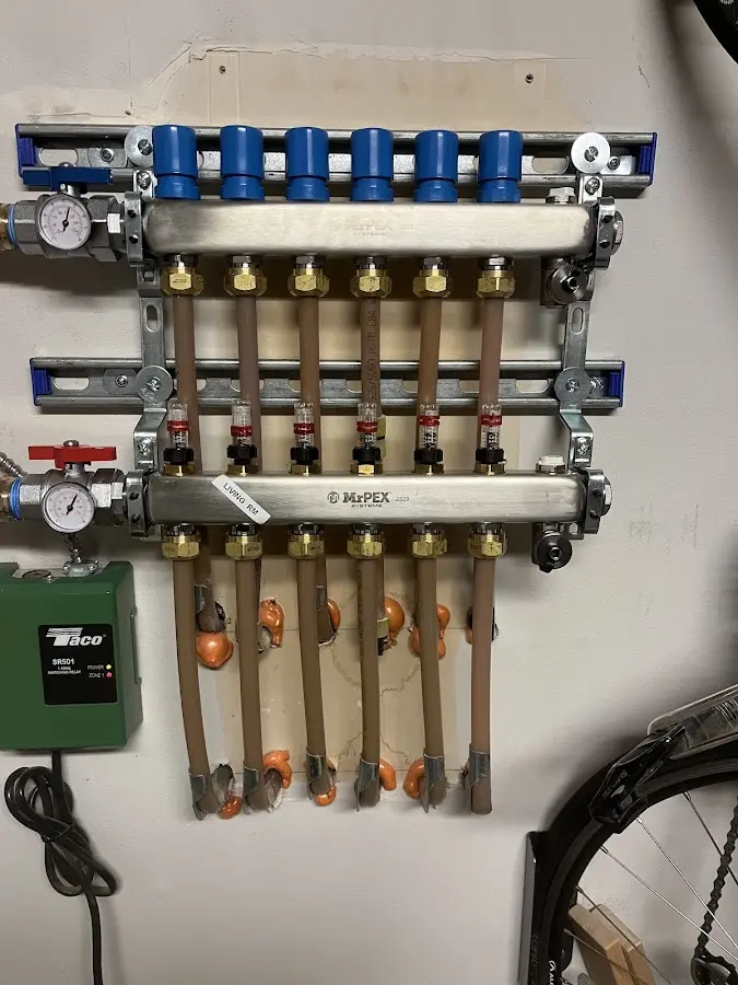 Plumber performing Gas Line Installation at a residential property in Ellettsville